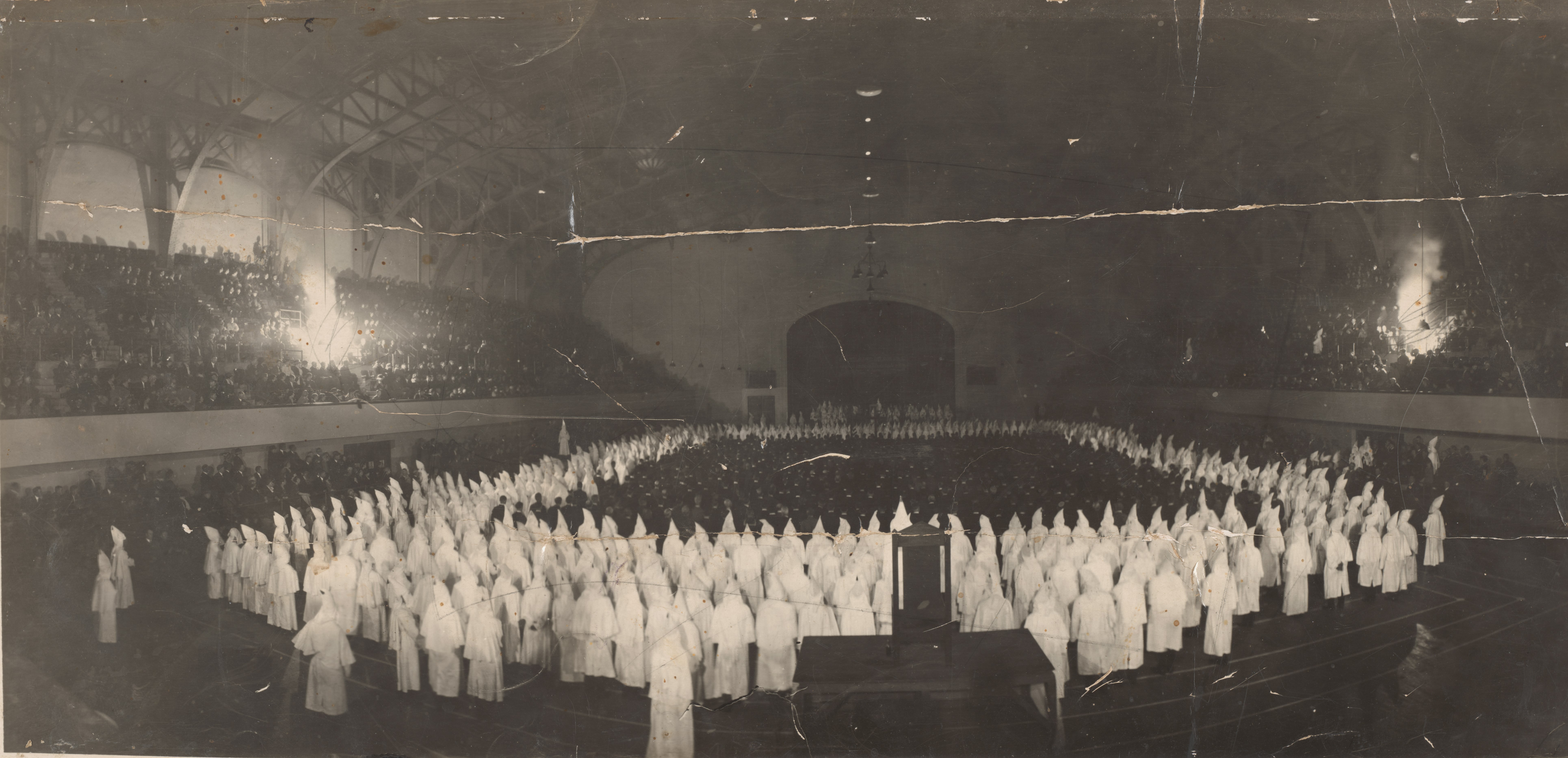 photo: In the 1920s, the Oakland Klan chapter had thousands of followers, and in 1925, 8,500 people participated in a Ku Klux Klan cross-burning ceremony inside the Oakland Auditorium (now known as the Kaiser Convention Center). Courtesy of the Bancroft Library, University of California, Berkeley