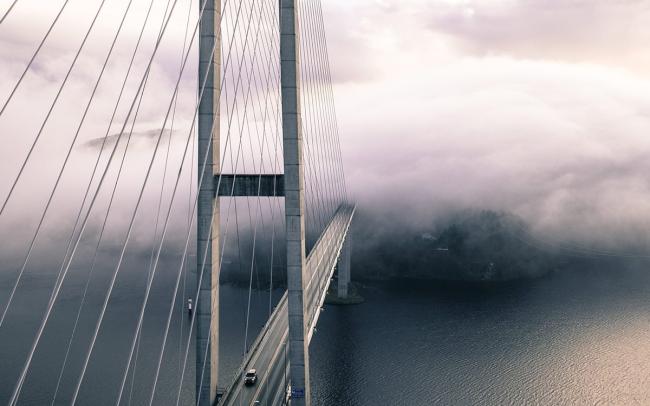 Photograph of a foggy bridge