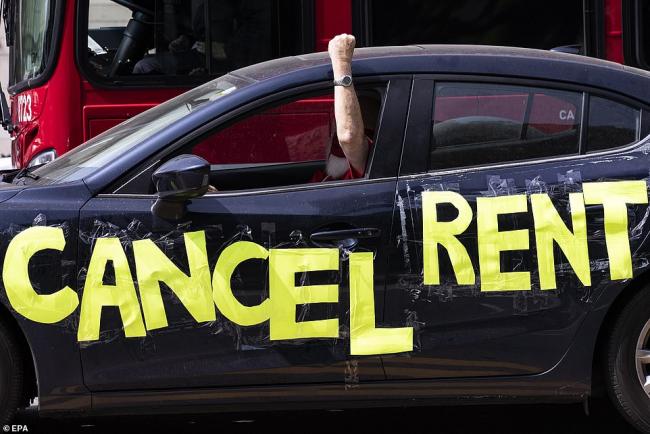 Car with "cancel rent" painted on it