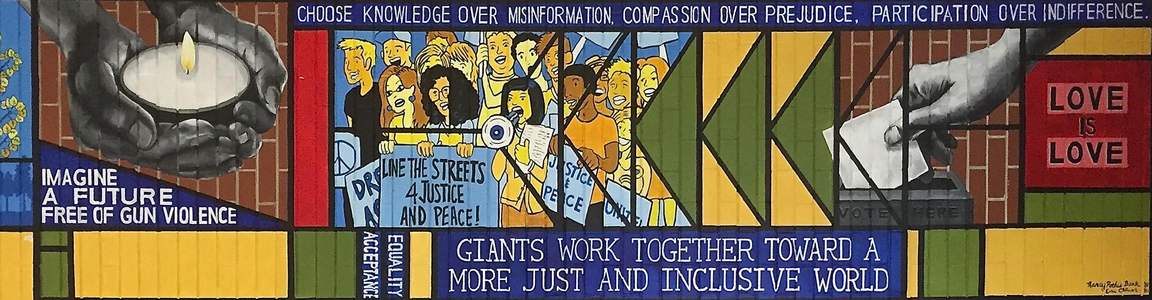 A social justice mural in at Highland Park High School in Illinois; the mural evokes stained glass art of Frank Lloyd Wright